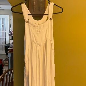 Bibi Textured wide leg jump suit. Cream colored, size large.